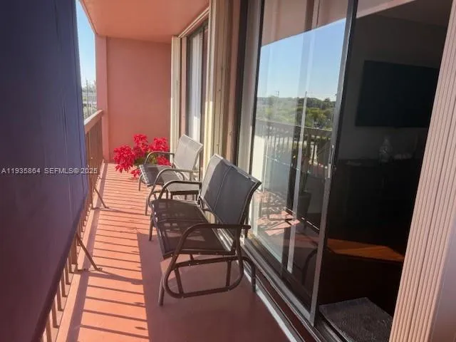 a kitchen with a refrigerator and a stove