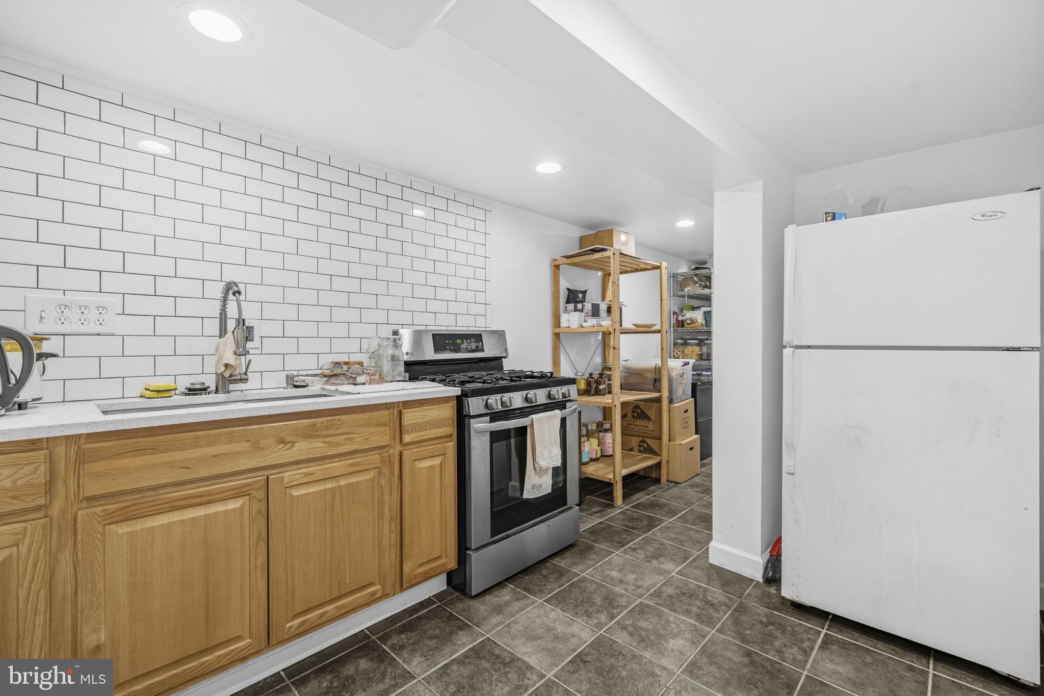 1824 3rd Street Northeast Washington, DC 20002 - Photo 24 of 30 Modern kitchen with sleek finishes.