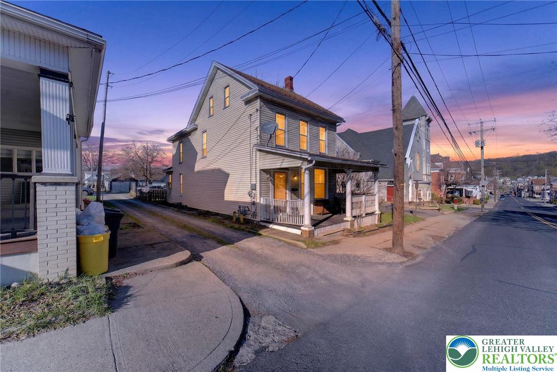 321 Market Street Bangor, PA 18013 - Photo 1 of 33 a street view with tall buildings