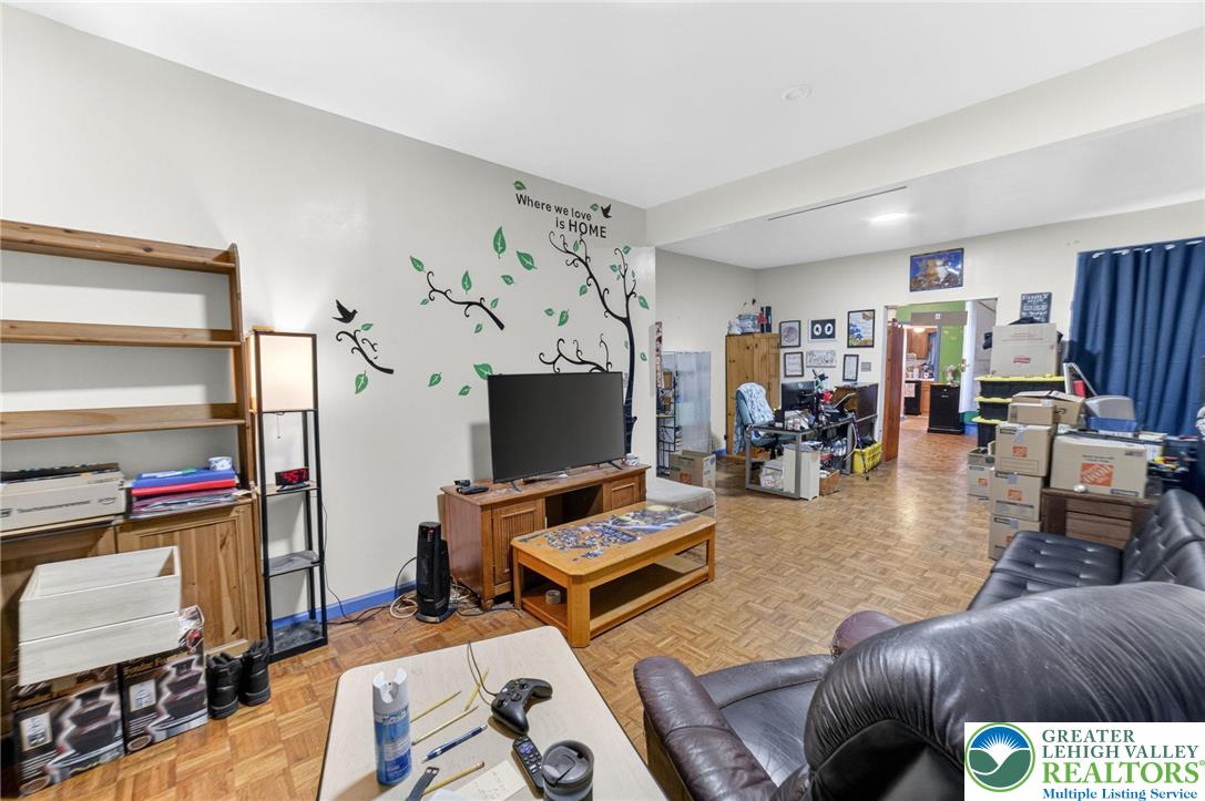 321 Market Street Bangor, PA 18013 - Photo 11 of 33 a living room with furniture and a flat screen tv