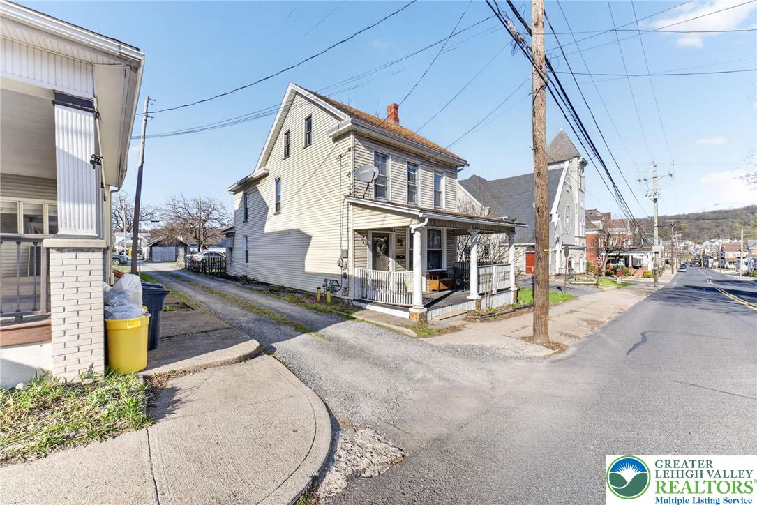 321 Market Street Bangor, PA 18013 - Photo 2 of 33 a view of a house with sitting area and slide