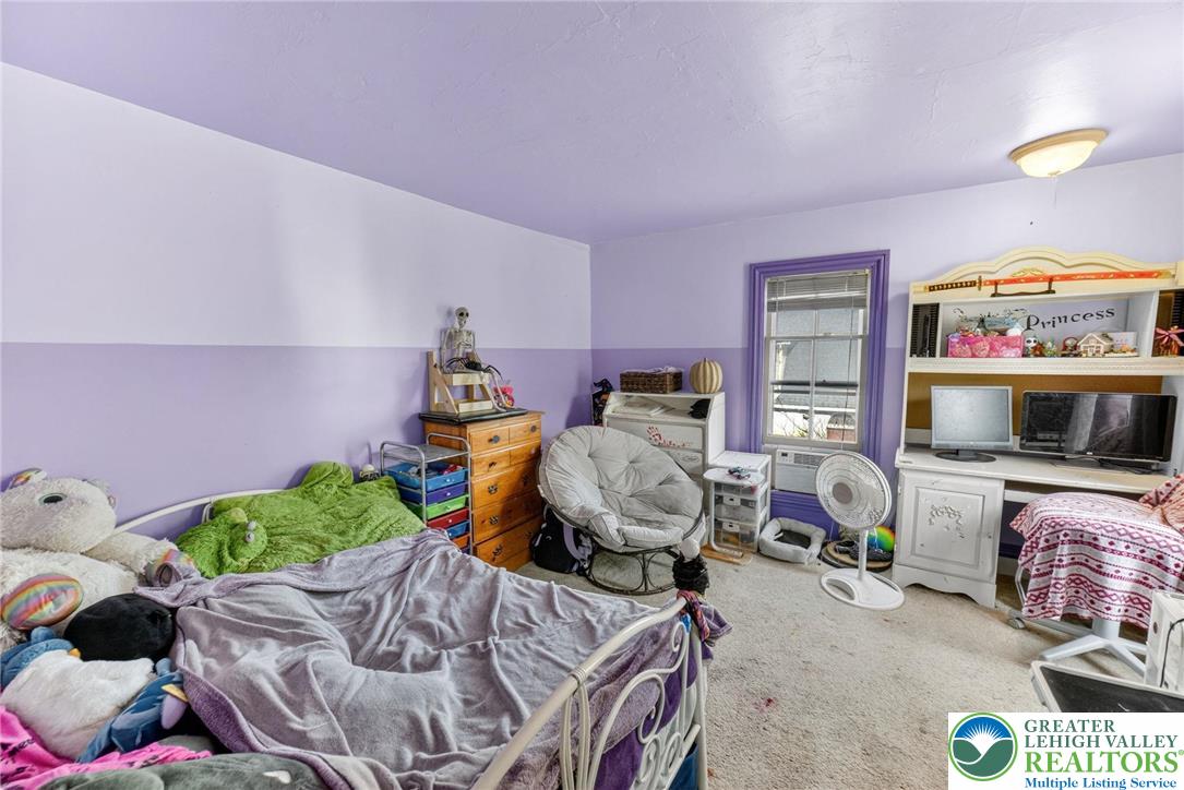 321 Market Street Bangor, PA 18013 - Photo 24 of 33 a bedroom with furniture and a flat screen tv