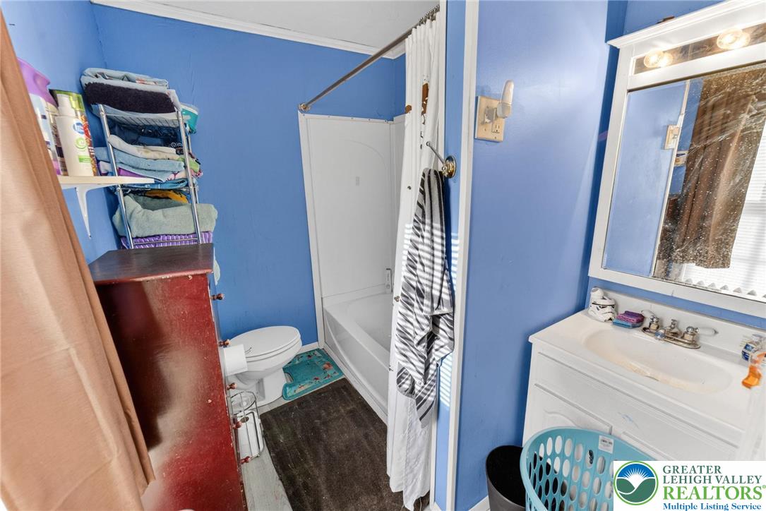 321 Market Street Bangor, PA 18013 - Photo 26 of 33 a bathroom with a sink toilet and shower