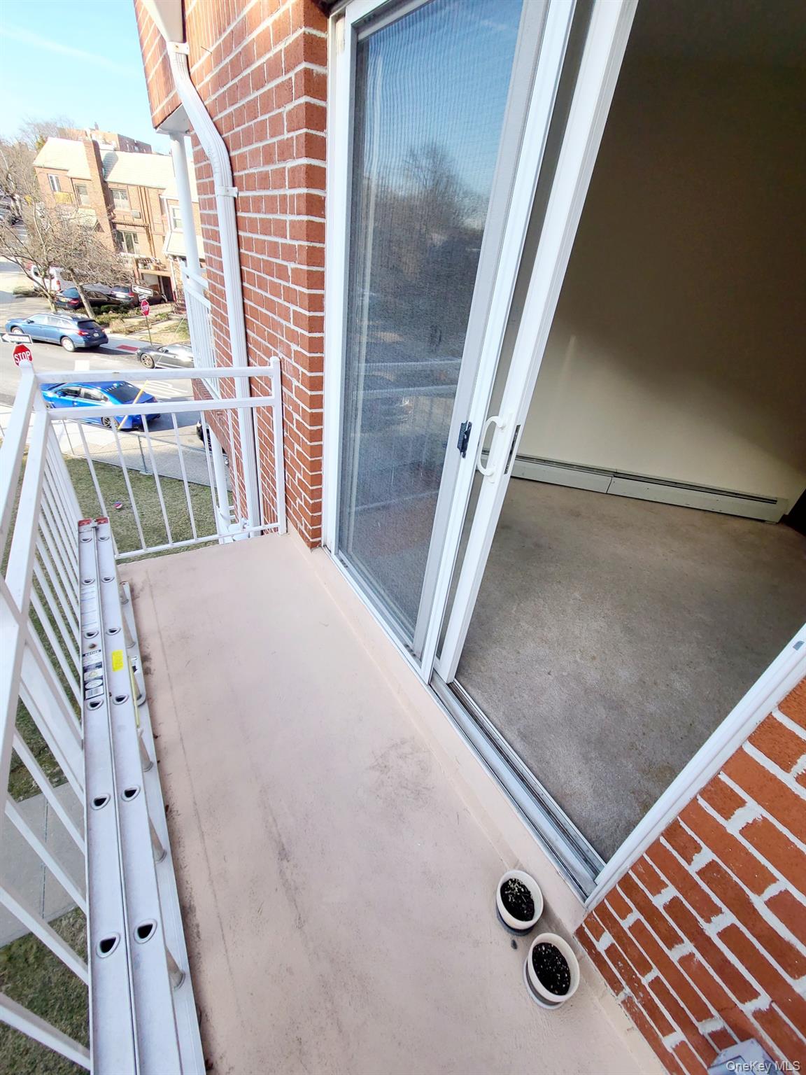 67-08 Exeter Street, Unit 3 Queens, NY 11375 - Photo 14 of 18 a view of a living room washer and dryer