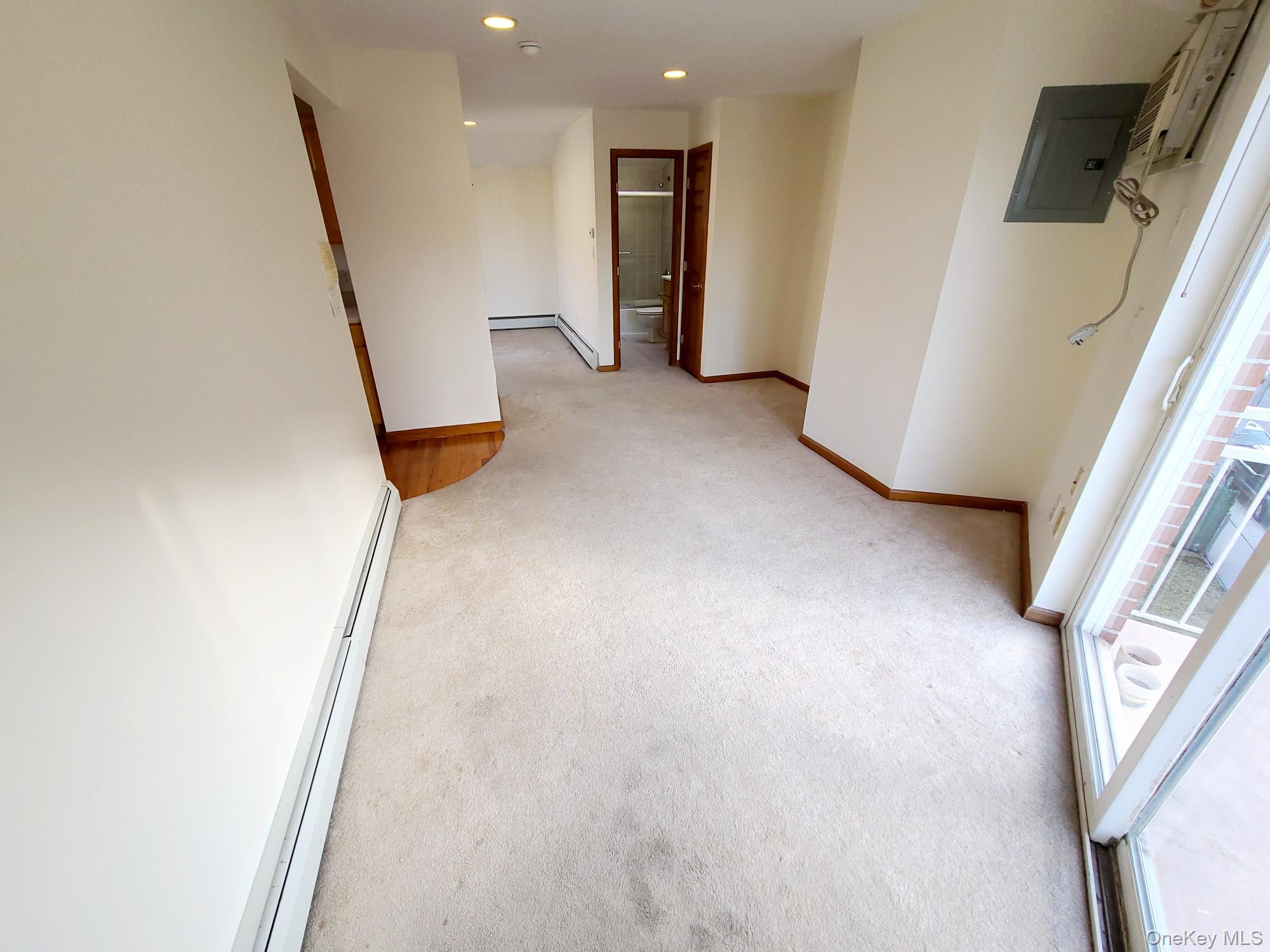 67-08 Exeter Street, Unit 3 Queens, NY 11375 - Photo 5 of 18 an entryway in a hall with an entryway