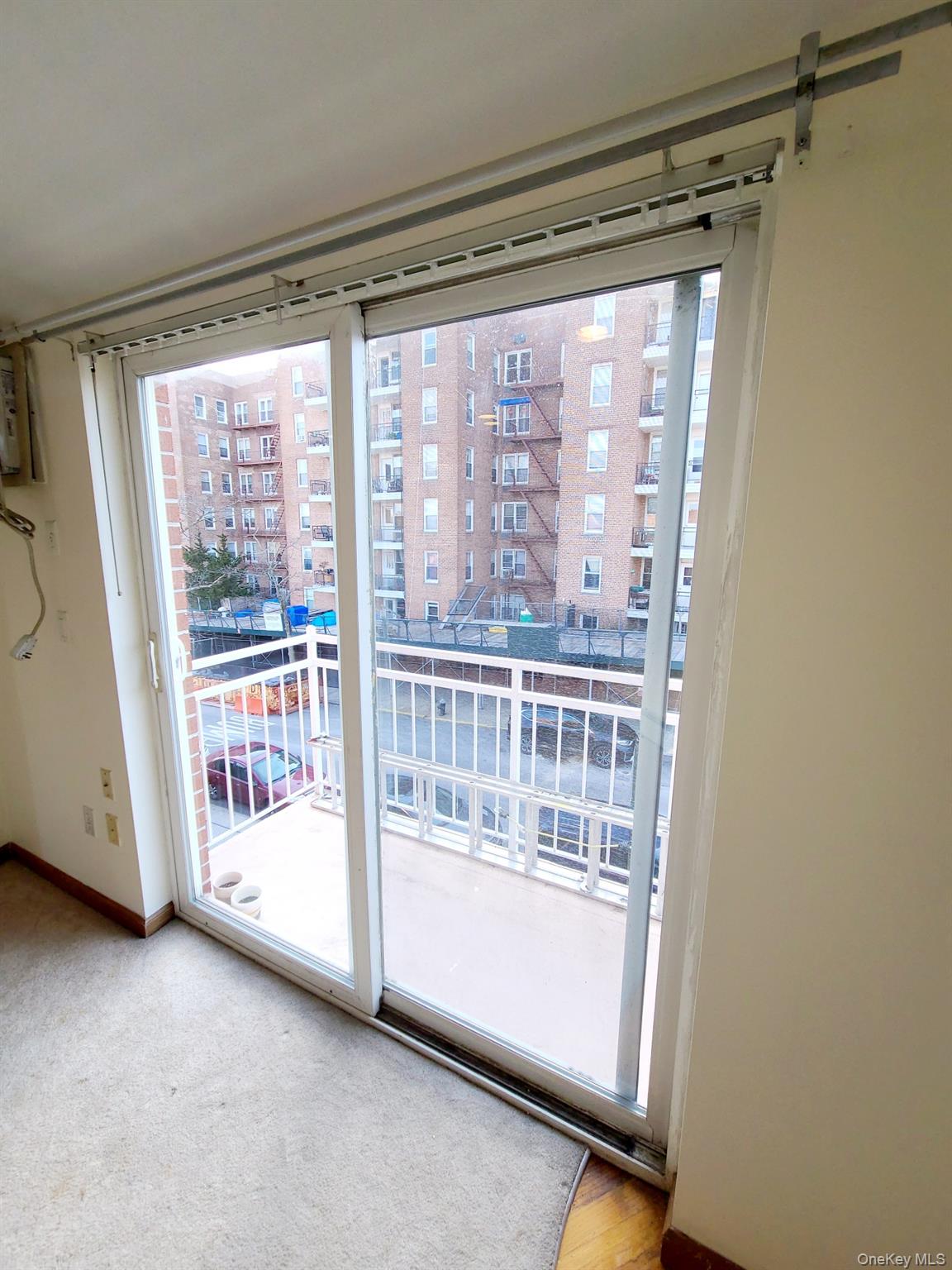 67-08 Exeter Street, Unit 3 Queens, NY 11375 - Photo 6 of 18 a view of a room with a large window
