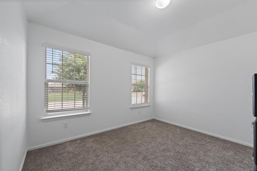 4600 Fringetree Way Crowley, TX 76036 - Photo 26 of 40 Bright room with neutral wall tones and plush carpeting