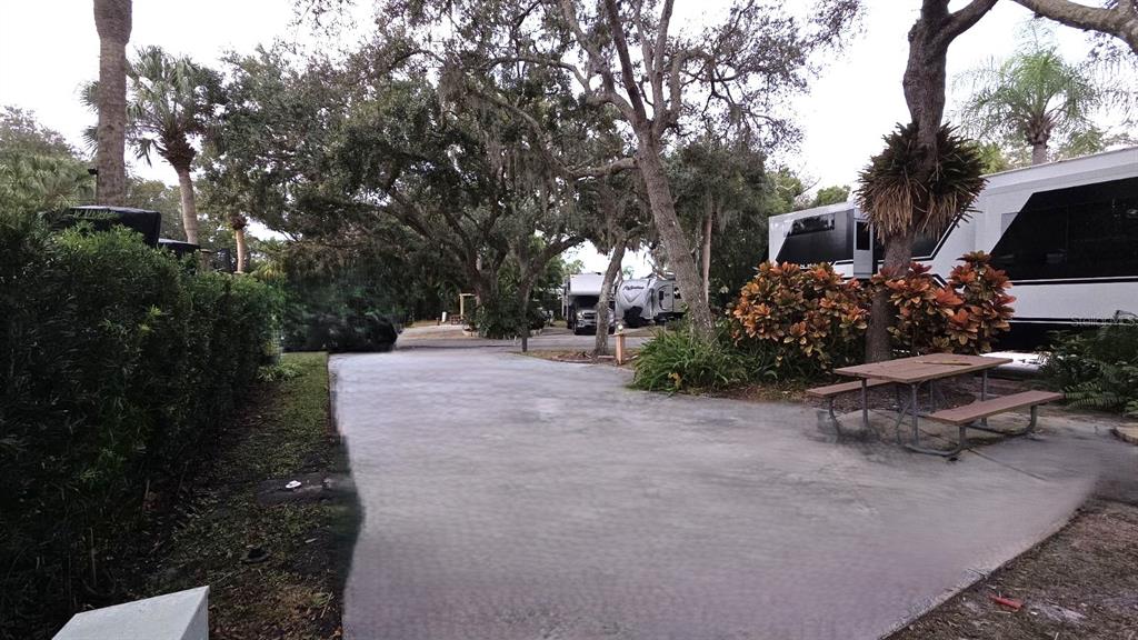 231 Stallion Lane River Ranch, FL 33867 - Photo 7 of 18 a view of a backyard with sitting area