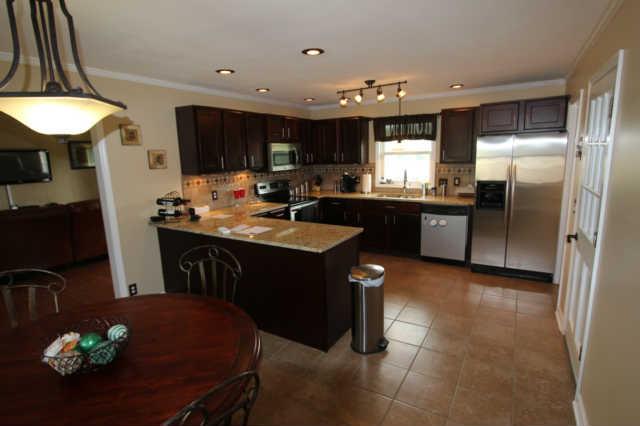 348 Shorter Road Lebanon, TN 37090 - Photo 5 of 9 Updated kitchen with stainless steel appliances and tile backsplash!