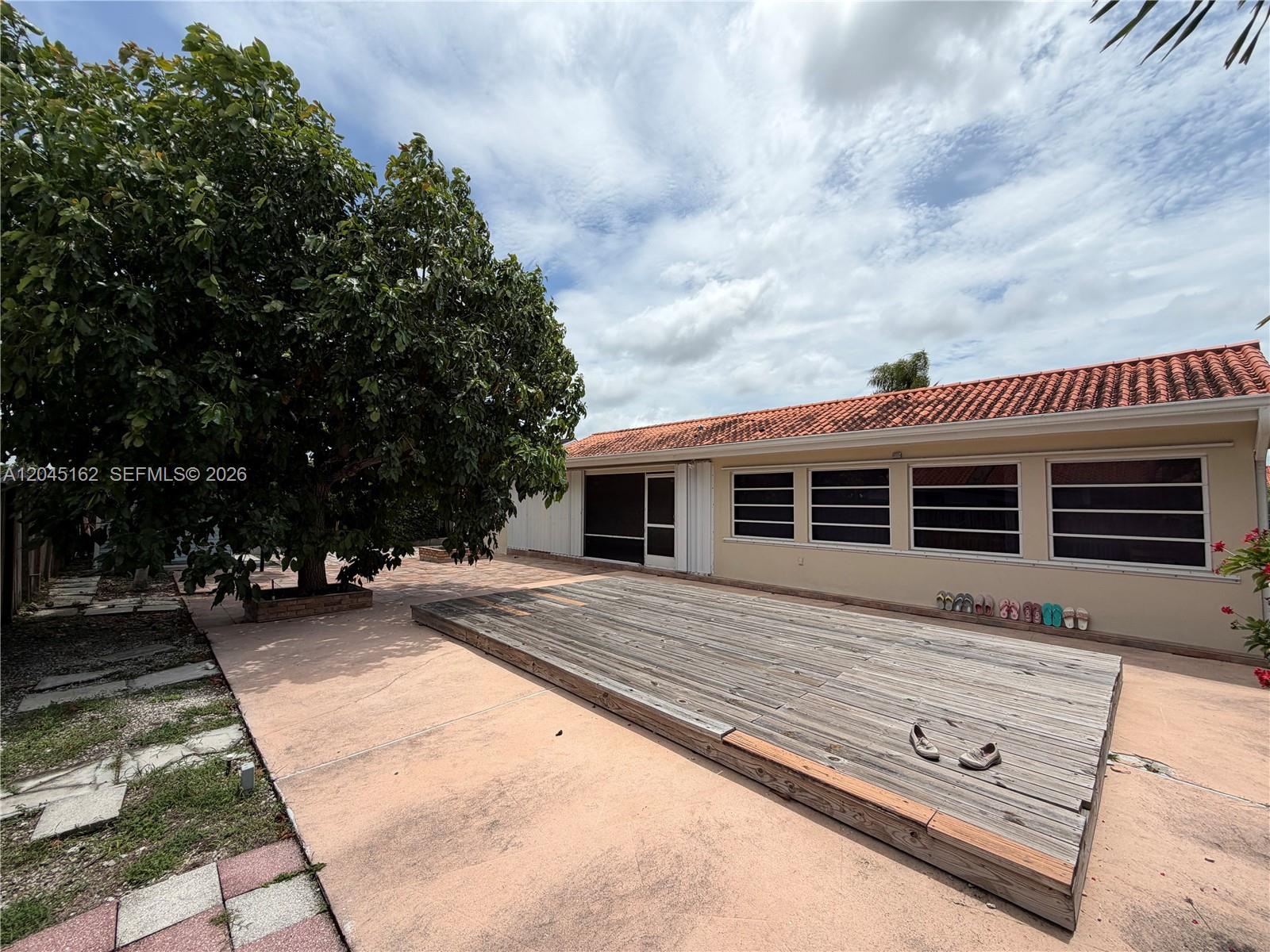 3262 Southwest 139th Place Miami, FL 33175 - Photo 31 of 36 a view of a house with a patio