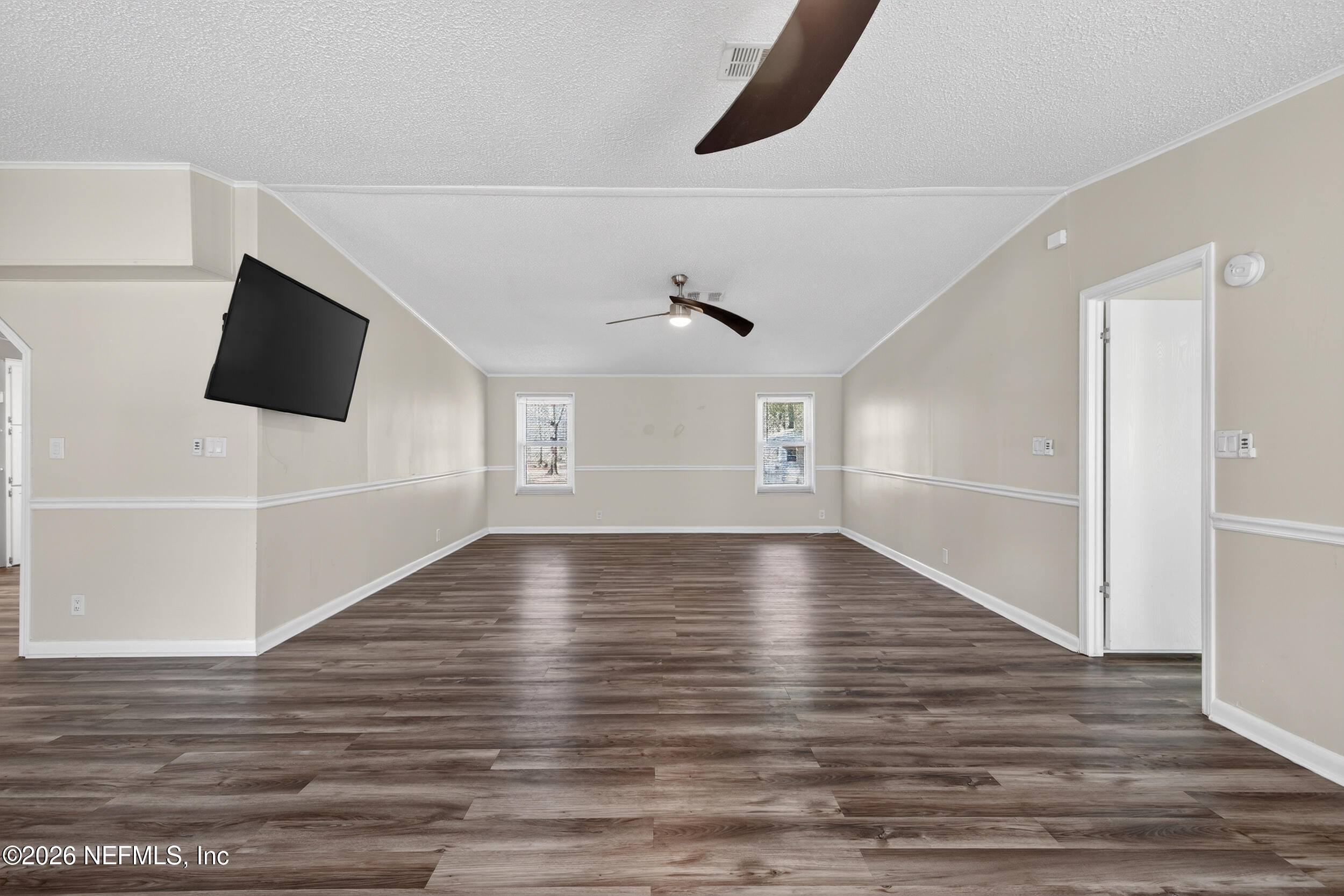 95021 Raintree Lane Fernandina Beach, FL 32034 - Photo 13 of 35 Living Room-TV conveys