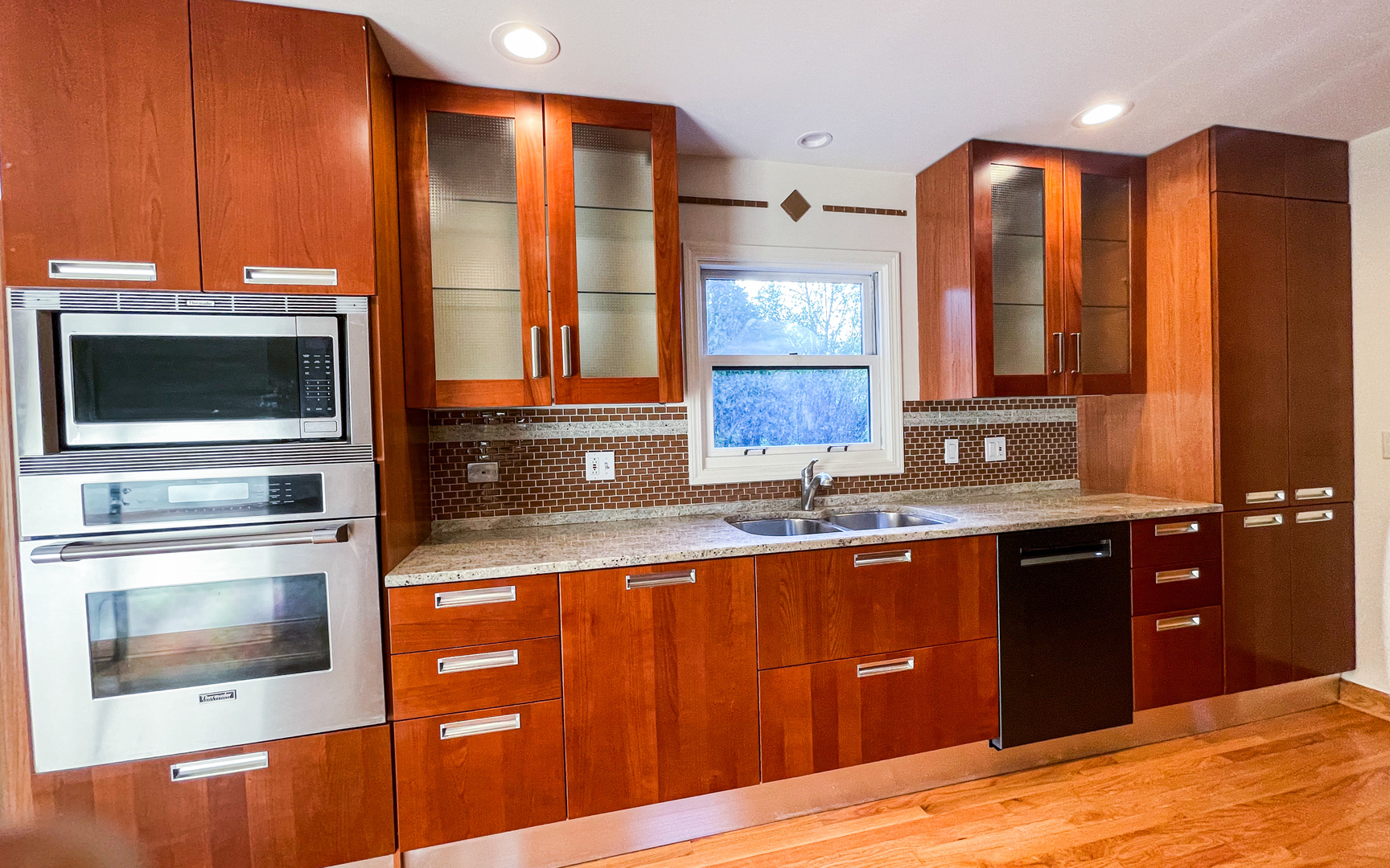 1640 Barry Lane Glenview, IL 60025 - Photo 15 of 42 a kitchen with stainless steel appliances granite countertop a sink and a microwave