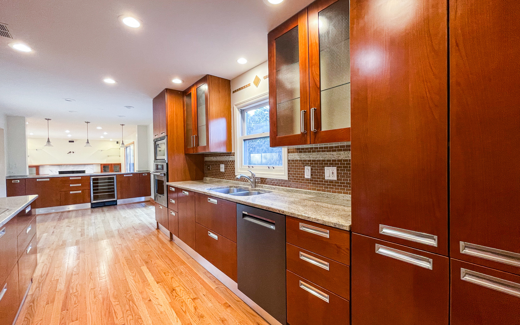 1640 Barry Lane Glenview, IL 60025 - Photo 17 of 42 a kitchen with stainless steel appliances granite countertop a stove and cabinets