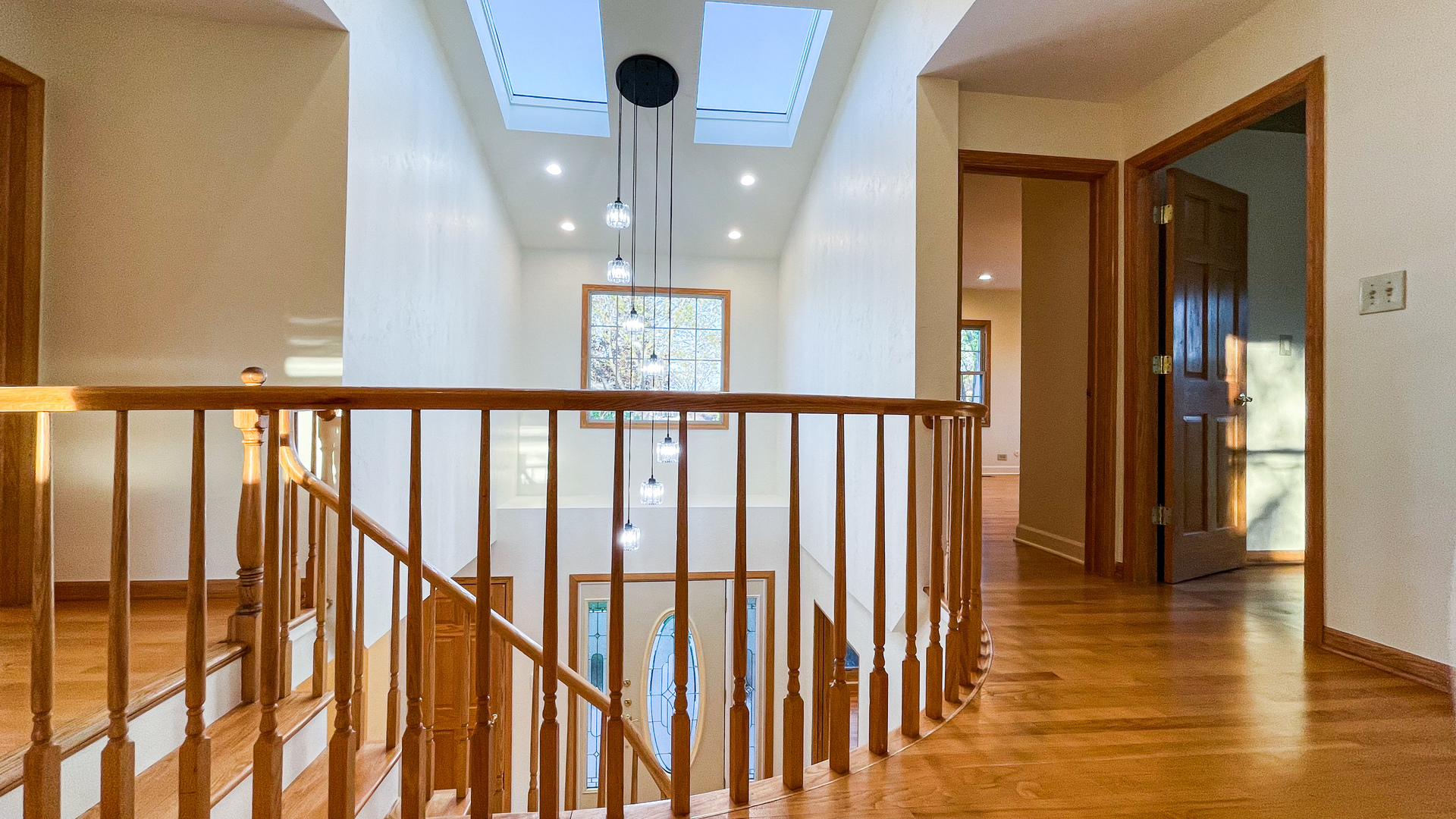 1640 Barry Lane Glenview, IL 60025 - Photo 19 of 42 a view of staircase with railing and wooden floor