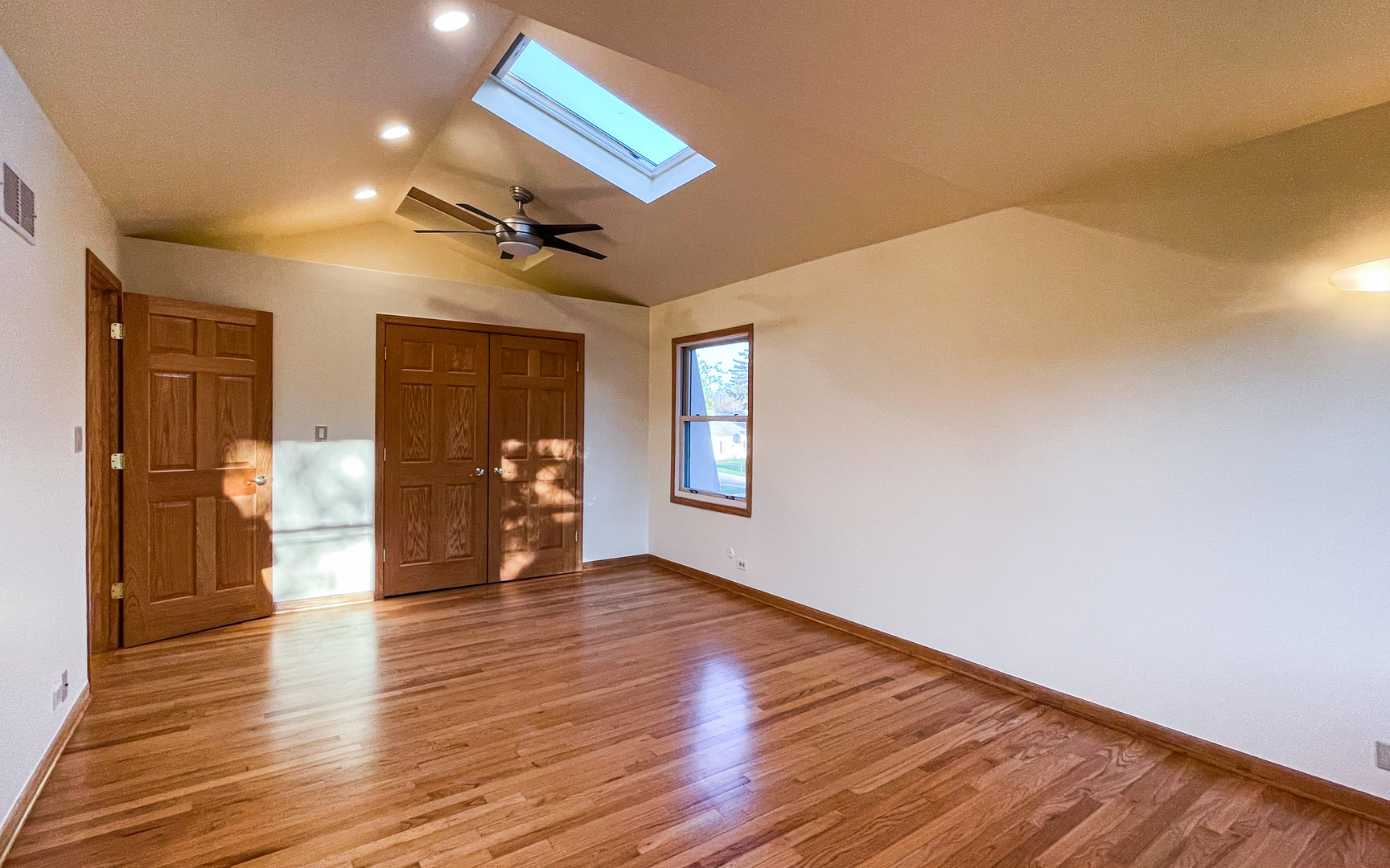 1640 Barry Lane Glenview, IL 60025 - Photo 21 of 42 a view of a hallway with wooden floor and a bathroom