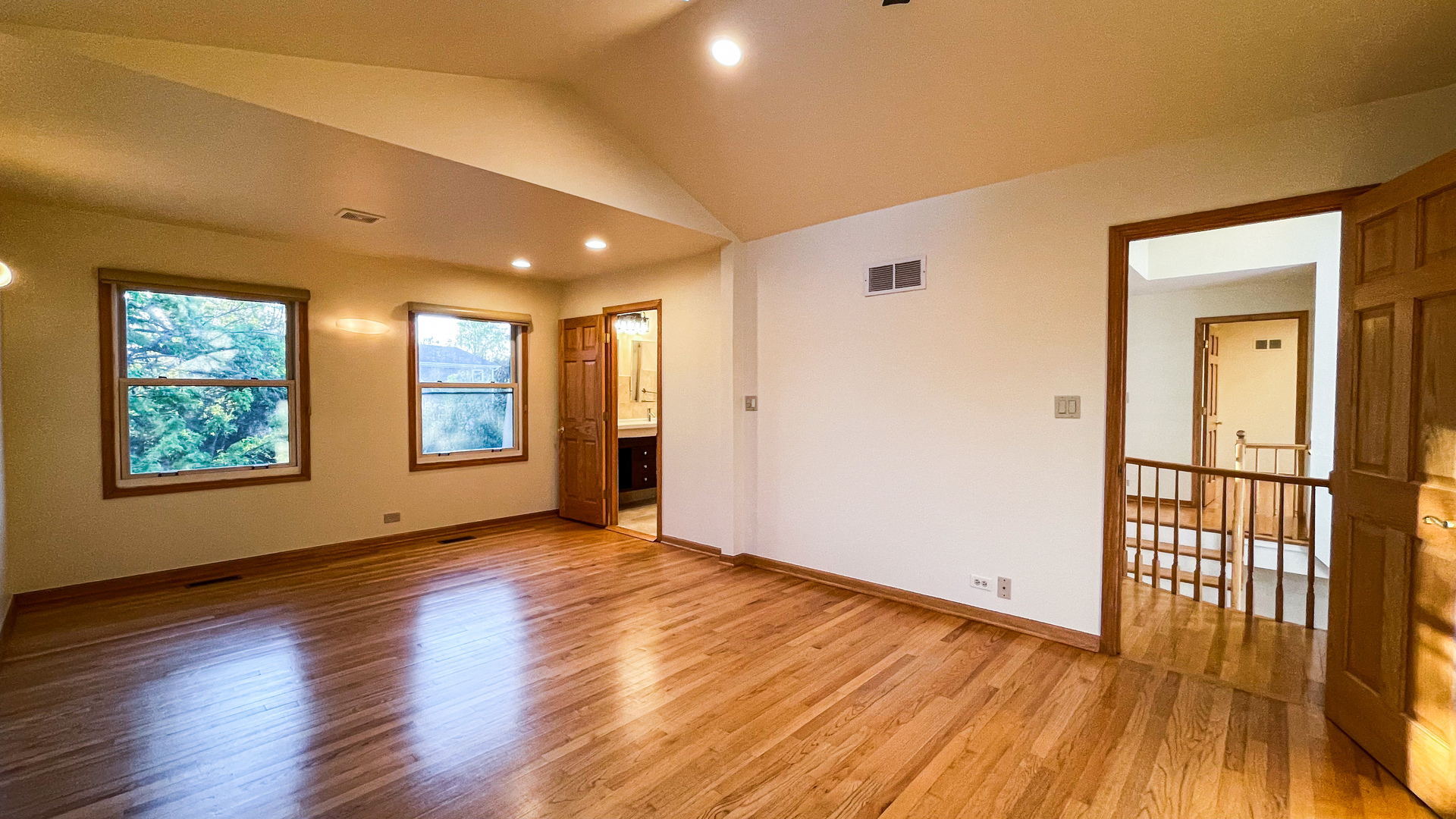 1640 Barry Lane Glenview, IL 60025 - Photo 27 of 42 a view of an empty room with glass door and wooden floor
