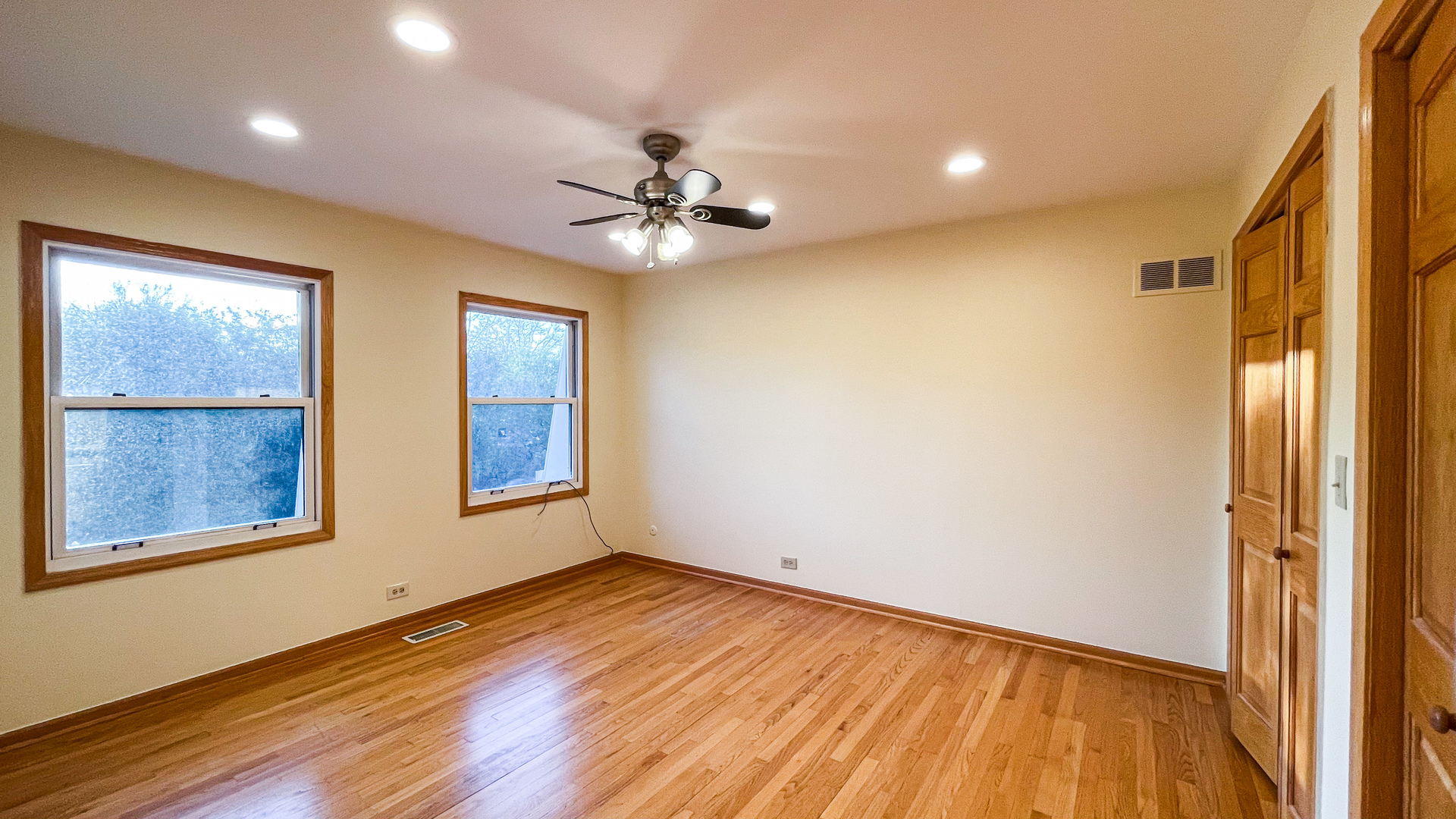 1640 Barry Lane Glenview, IL 60025 - Photo 29 of 42 wooden floor in an empty room with a window