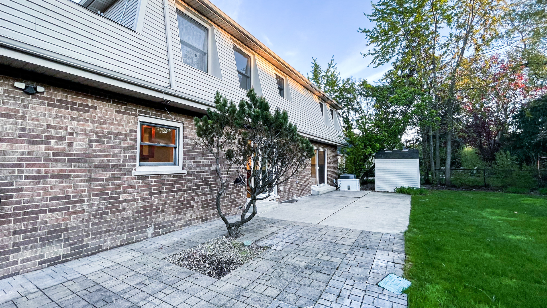 1640 Barry Lane Glenview, IL 60025 - Photo 41 of 42 a front view of a house with yard and trees