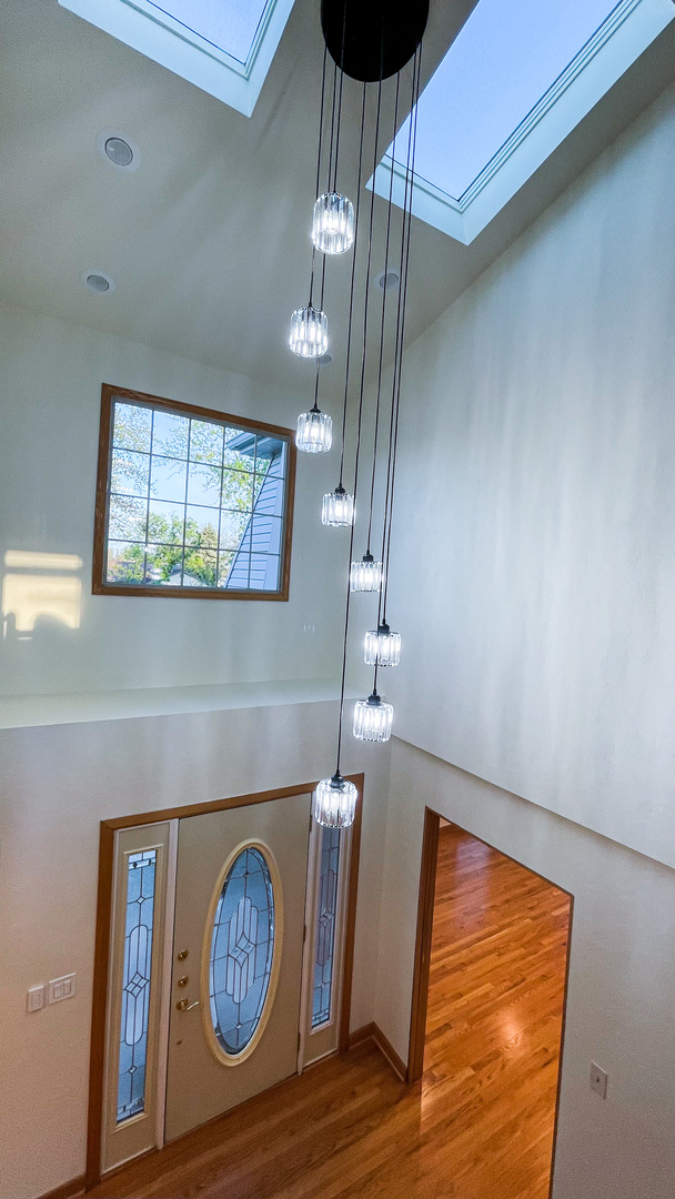 1640 Barry Lane Glenview, IL 60025 - Photo 5 of 42 a view of entryway with wooden floor