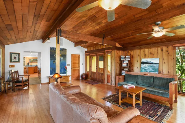 a kitchen with stainless steel appliances a sink and a refrigerator
