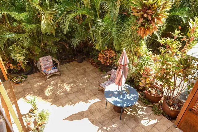 a kitchen with a sink cabinets and window