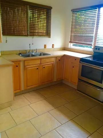 a view of a room that has a window in it