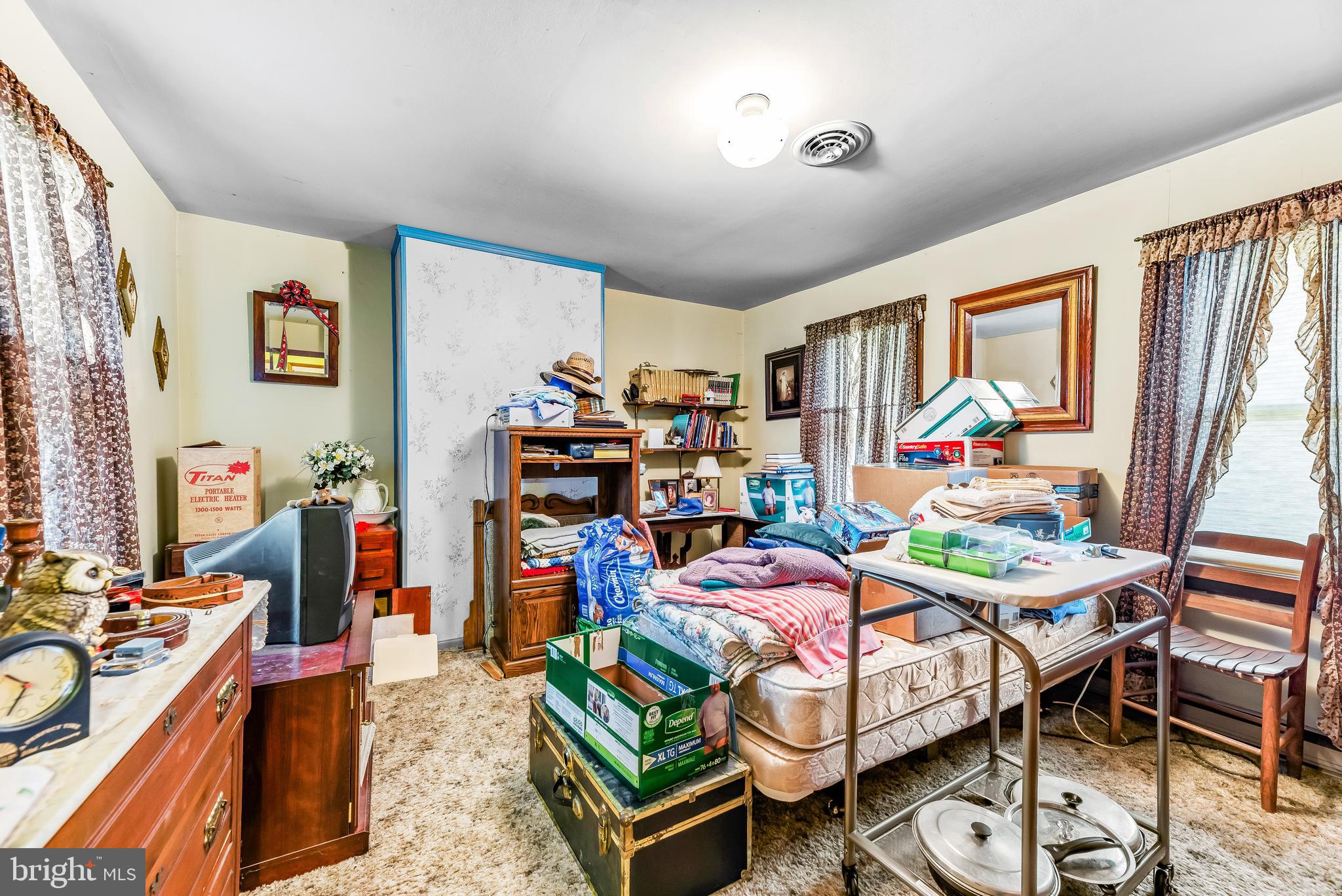 3695 Plum Point Road Huntingtown, MD 20639 - Photo 25 of 27 Little TLC and these bedrooms are great for space.