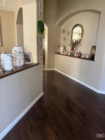 a view of a livingroom with wooden floor