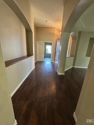 a view of gallery with wooden floor