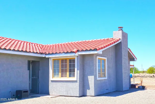 a front view of a house with a garage