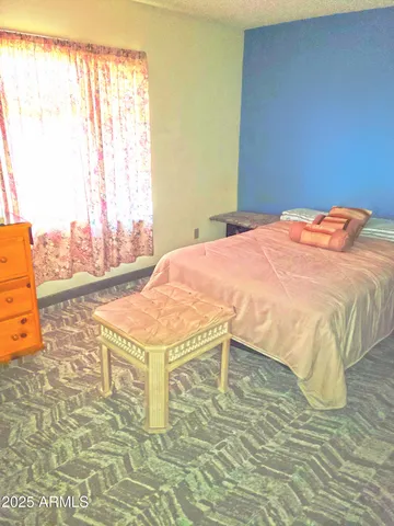 a view of entryway with wooden floor and door