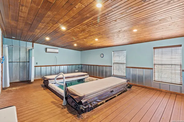 a room with a table and chairs