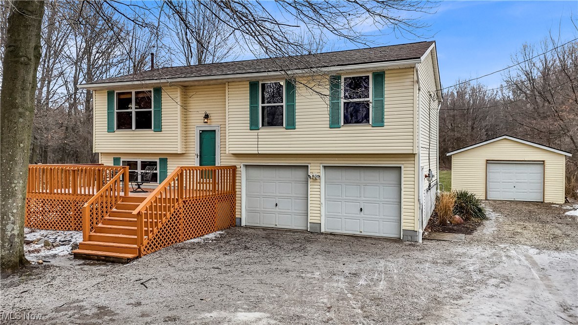 8110 Risden Road Vermilion, OH 44089 - Photo 1 of 48 Split foyer home with a wooden deck