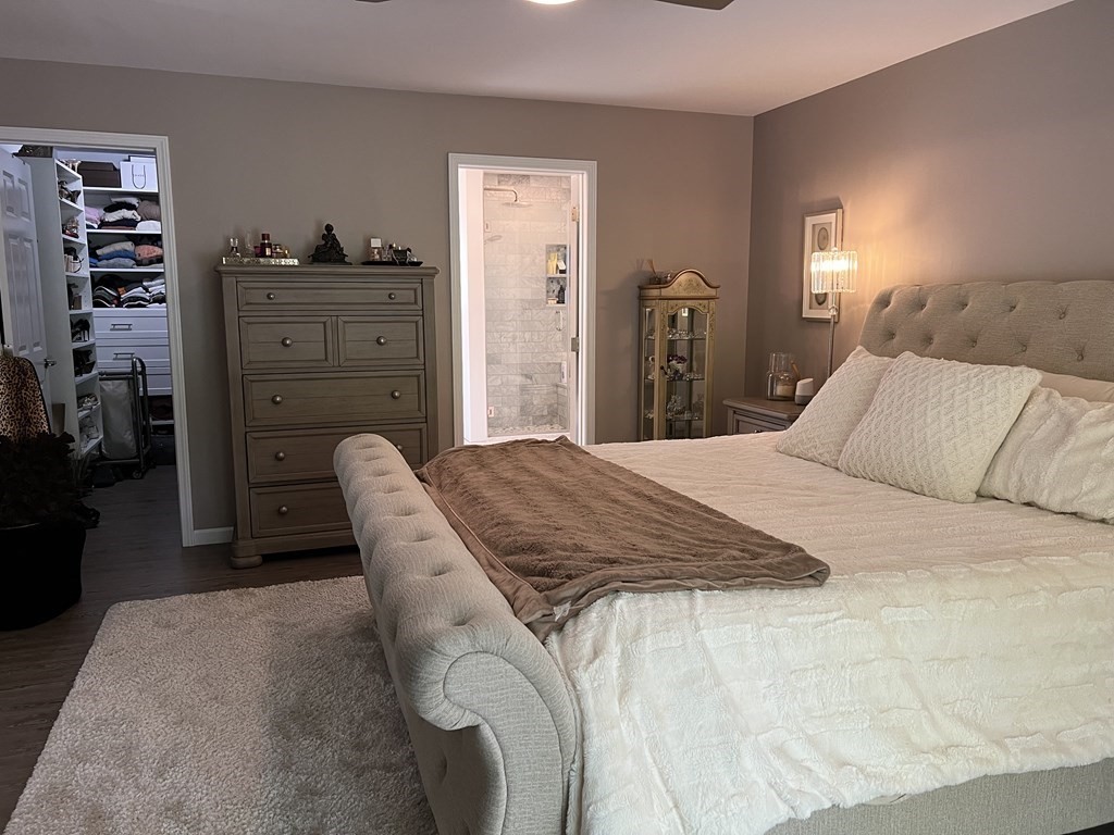 171 Forest Street Middleton, MA 01949 - Photo 13 of 35 a bedroom with a bed and furniture