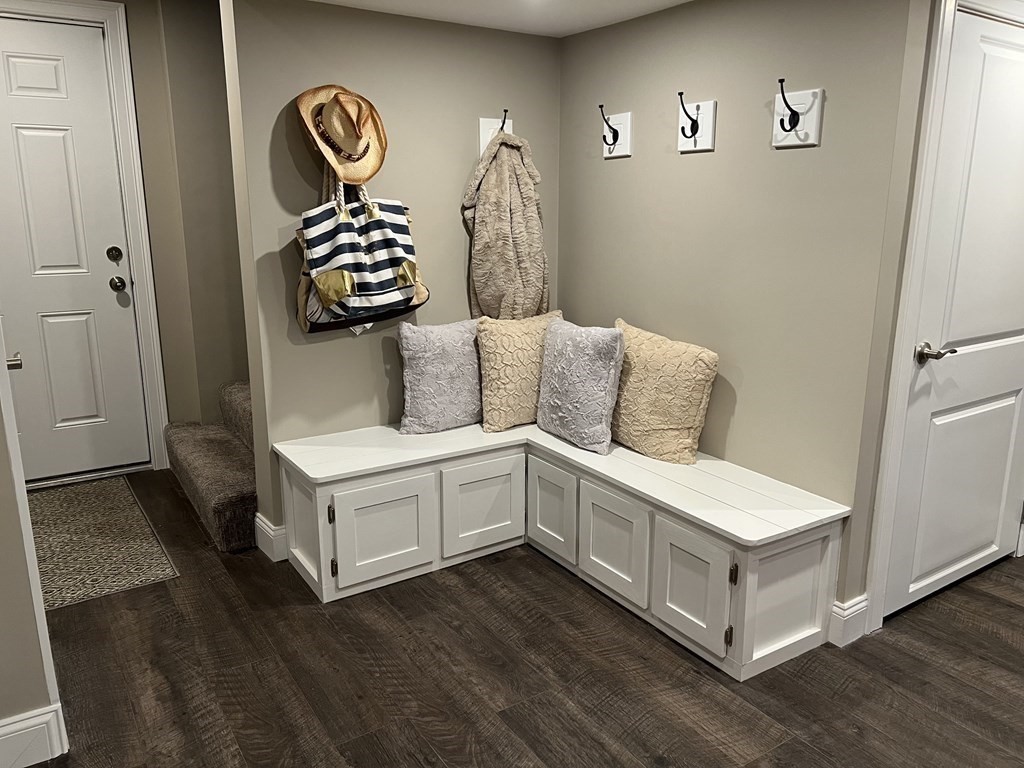 171 Forest Street Middleton, MA 01949 - Photo 25 of 35 a living room with furniture and a wooden floor