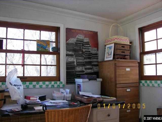 1142 California Avenue Reno, NV 89509 - Photo 4 of 9 a living room with furniture and a window