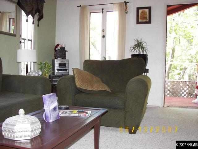 1142 California Avenue Reno, NV 89509 - Photo 6 of 9 a living room with furniture and a window