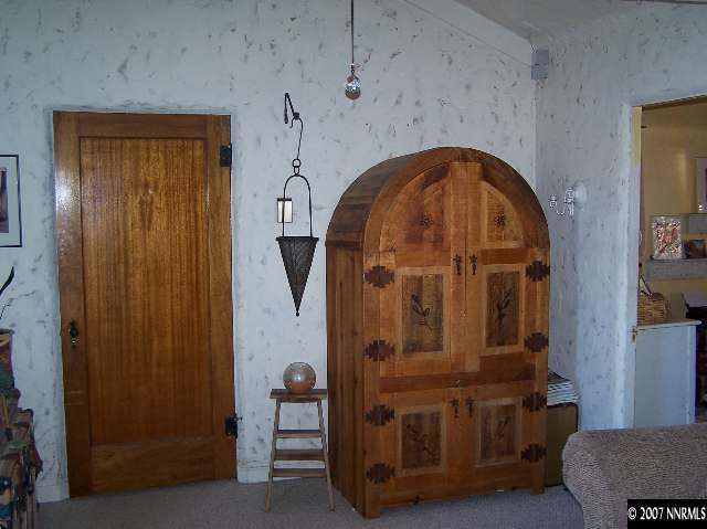 1142 California Avenue Reno, NV 89509 - Photo 8 of 9 a view of a door with furniture