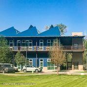 35 Widget Street, Unit 516 Basalt, CO 81621 - Photo 3 of 14 a front view of a house with swimming pool