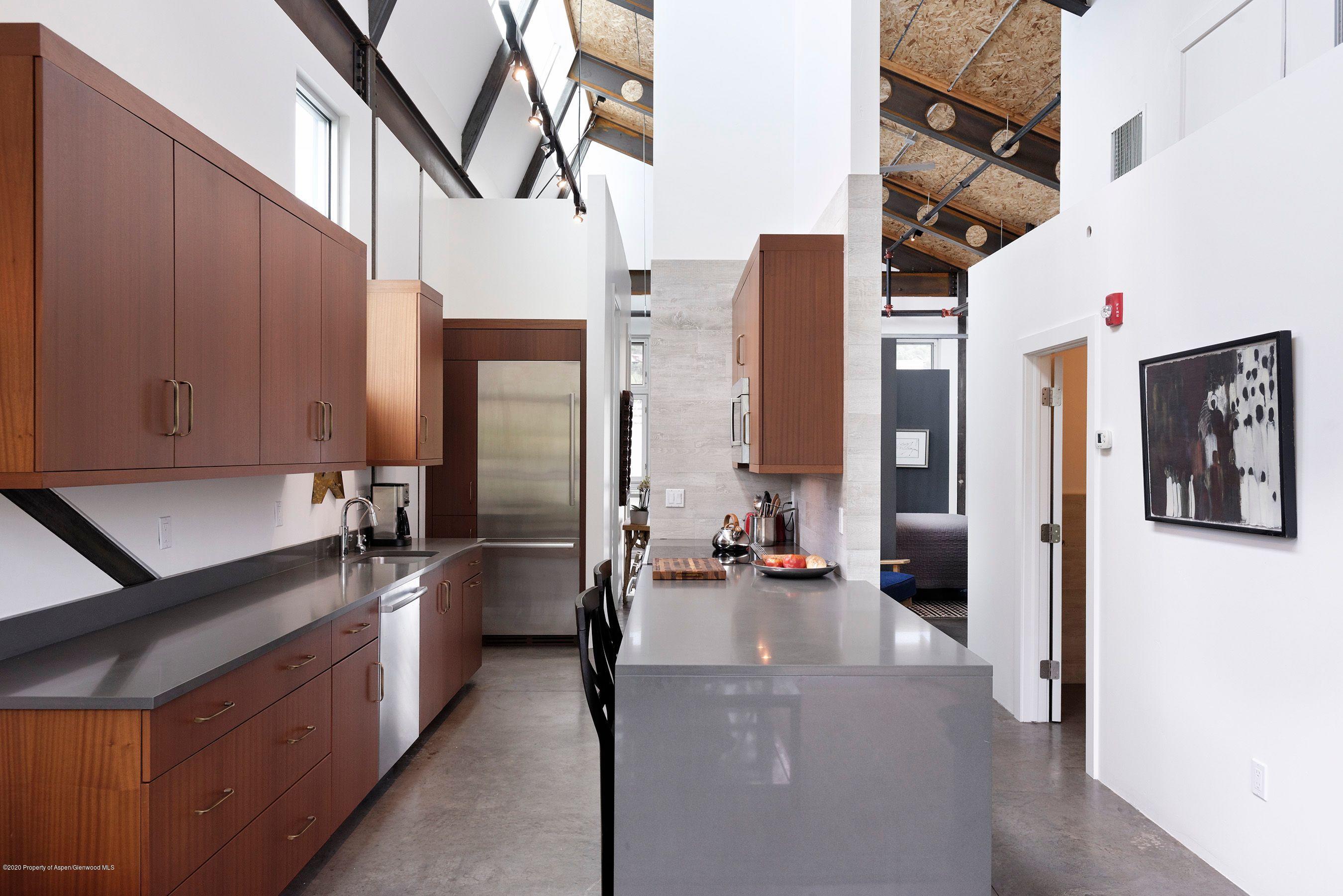 35 Widget Street, Unit 516 Basalt, CO 81621 - Photo 8 of 14 a view of living room with furniture and flat screen tv