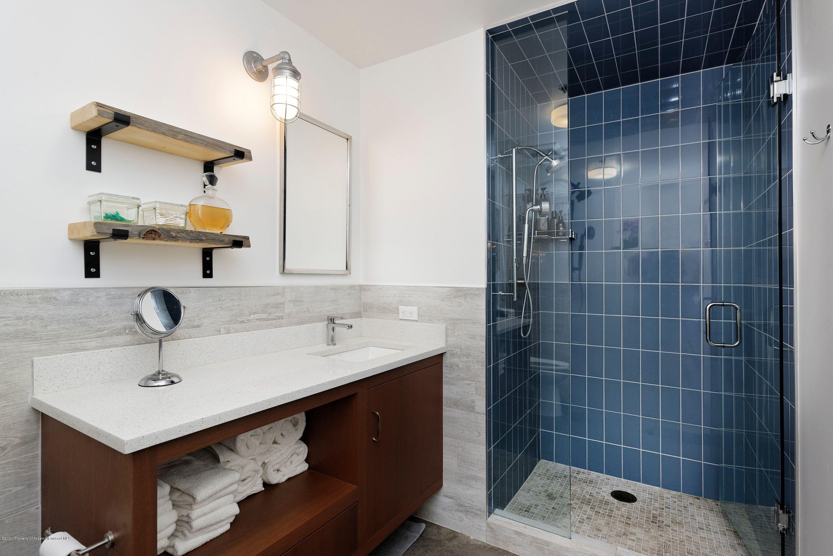 35 Widget Street, Unit 516 Basalt, CO 81621 - Photo 9 of 14 a bathroom with a sink and a mirror