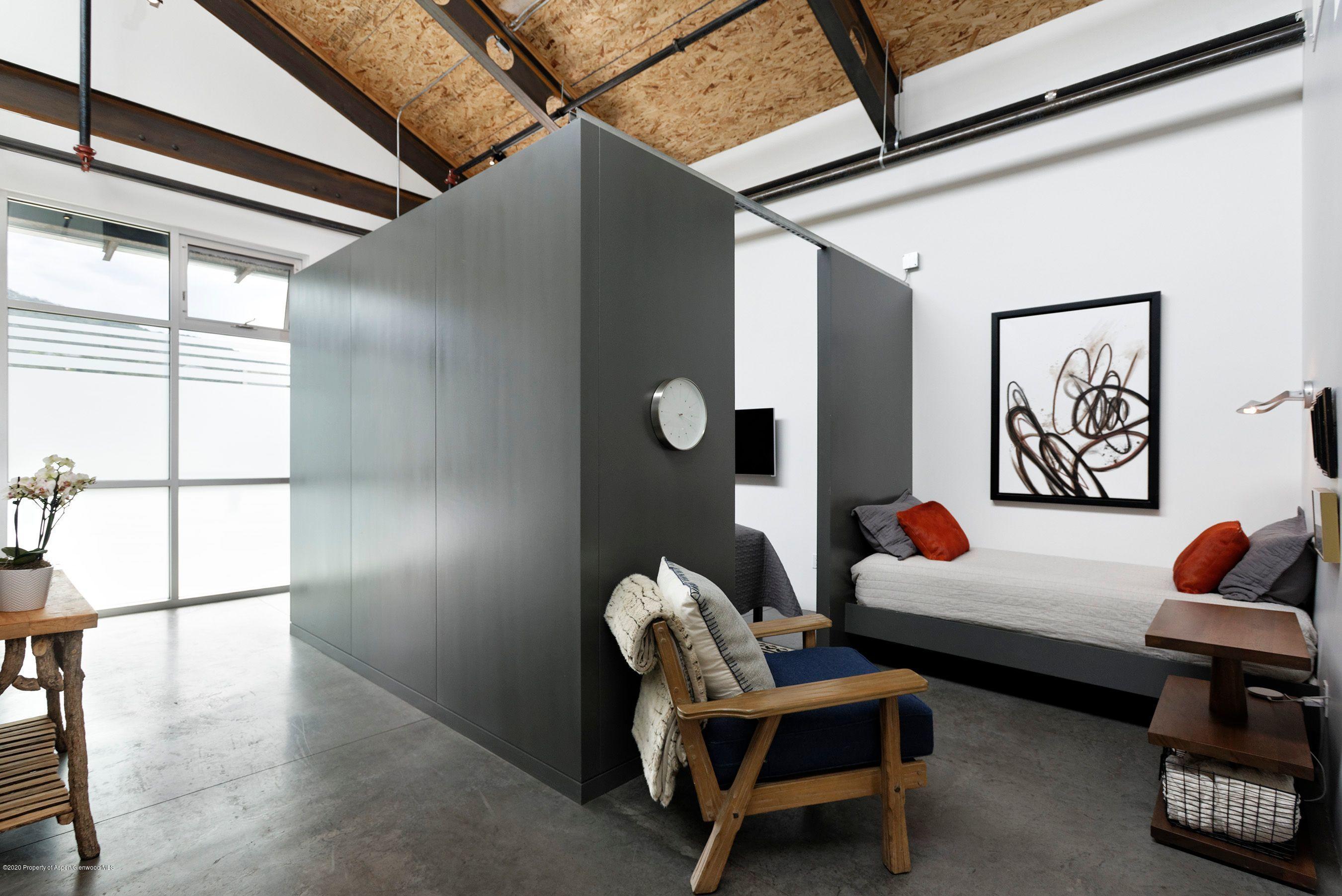 35 Widget Street, Unit 516 Basalt, CO 81621 - Photo 10 of 14 a bedroom with furniture and a window