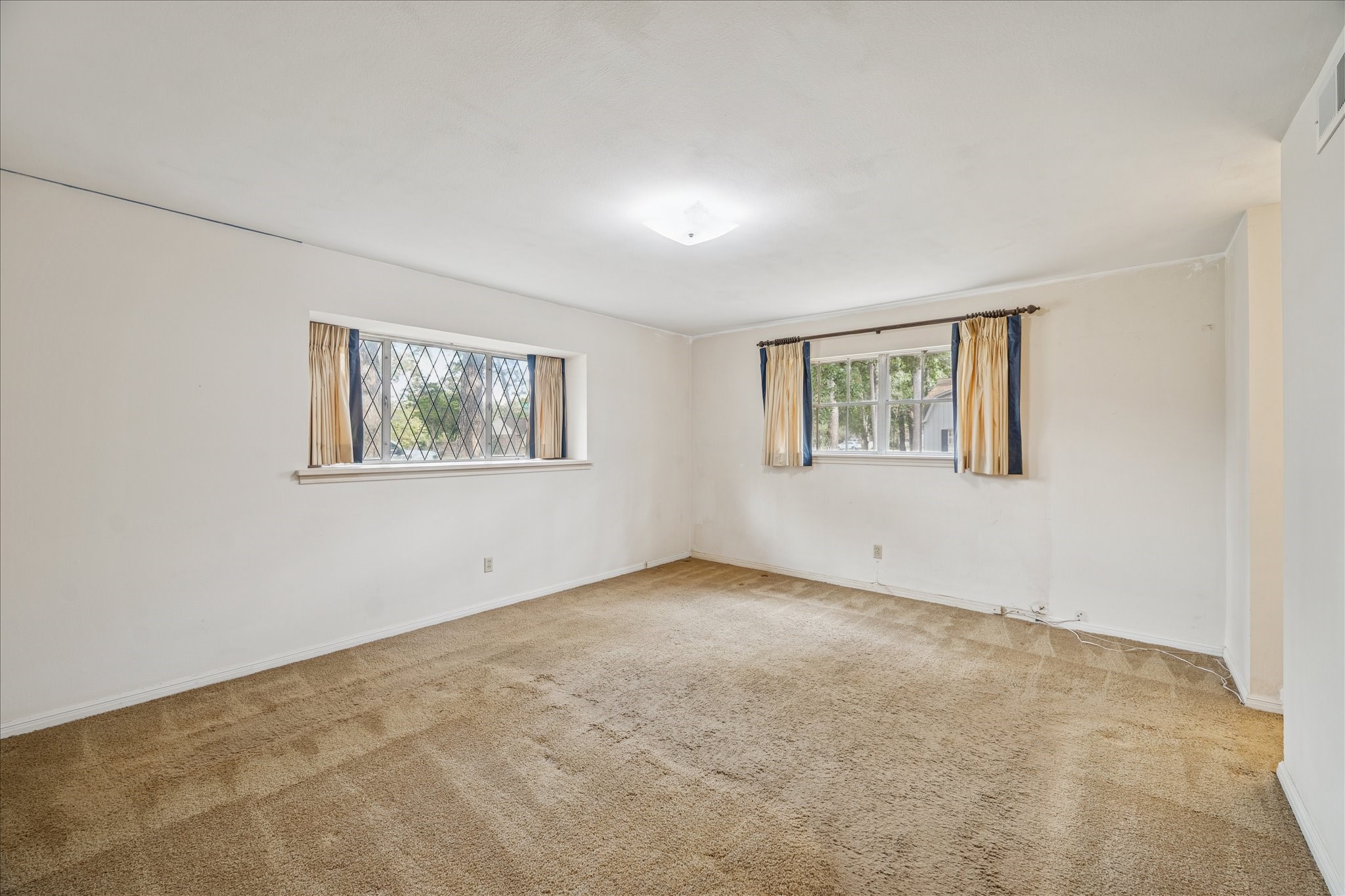13603 Boca Raton Drive Houston, TX 77069 - Photo 11 of 27 a view of an empty room with a window