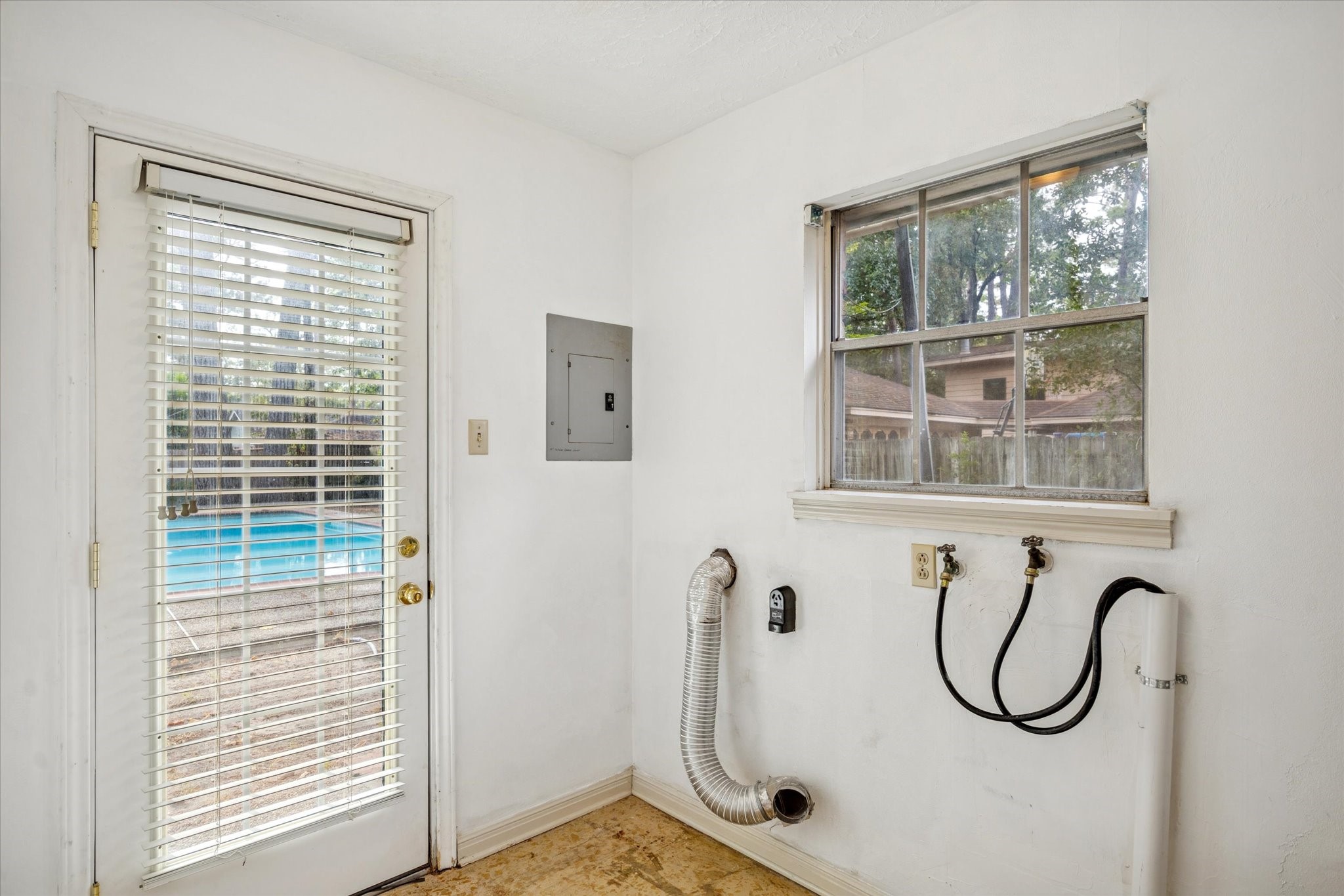 13603 Boca Raton Drive Houston, TX 77069 - Photo 18 of 27 a view of a room with rack and windows