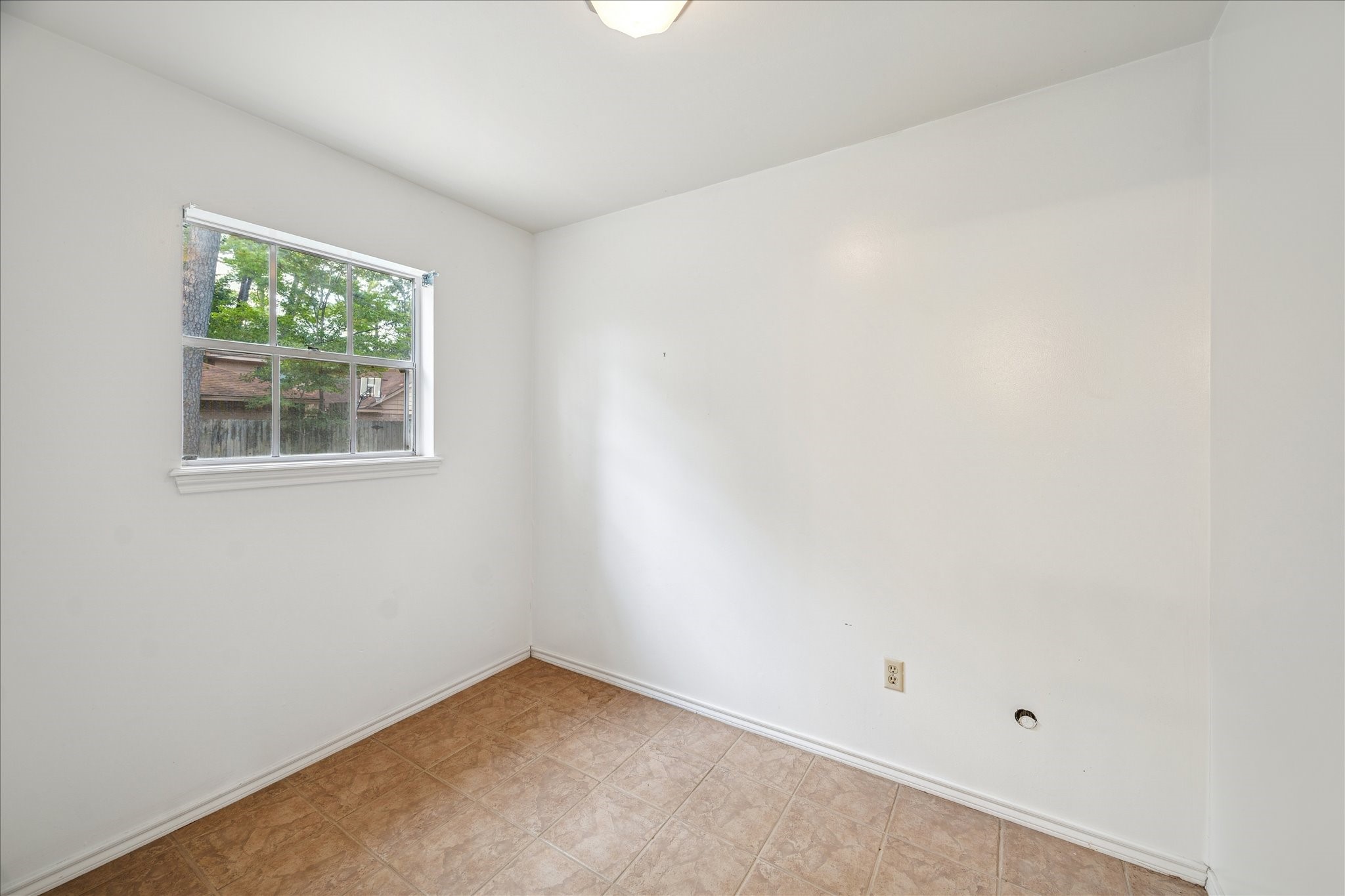 13603 Boca Raton Drive Houston, TX 77069 - Photo 24 of 27 an empty room with a window