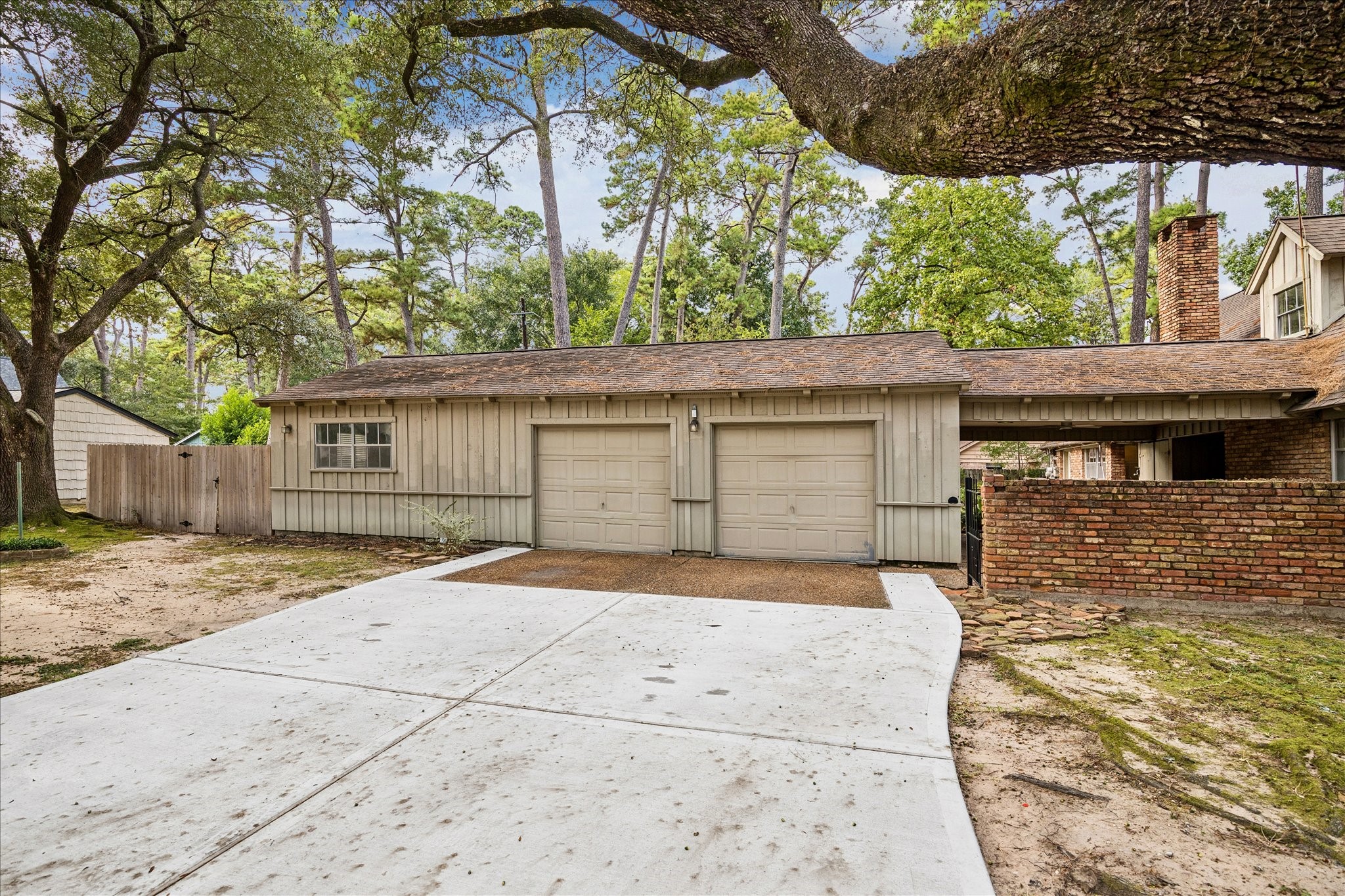 13603 Boca Raton Drive Houston, TX 77069 - Photo 26 of 27 a front view of a house with a yard and garage