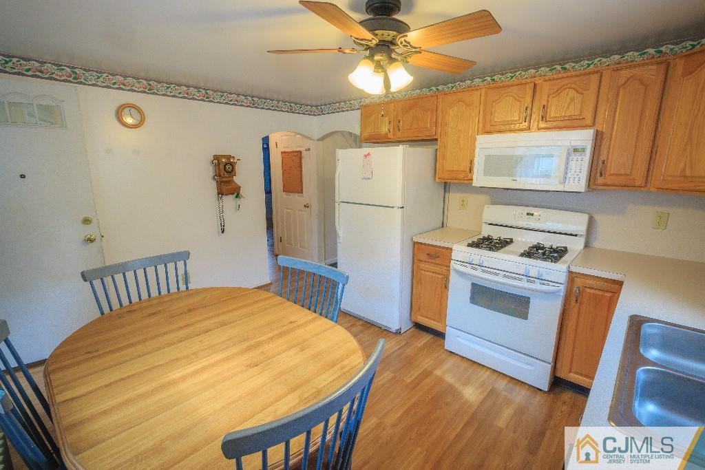 129 Middlesex Avenue Iselin, NJ 08830 - Photo 12 of 23 a kitchen with a refrigerator and a stove