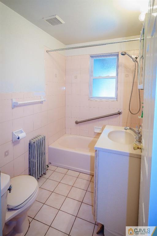 129 Middlesex Avenue Iselin, NJ 08830 - Photo 16 of 23 a bathroom with a sink toilet and shower