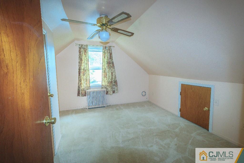 129 Middlesex Avenue Iselin, NJ 08830 - Photo 21 of 23 a view of an empty room with a window