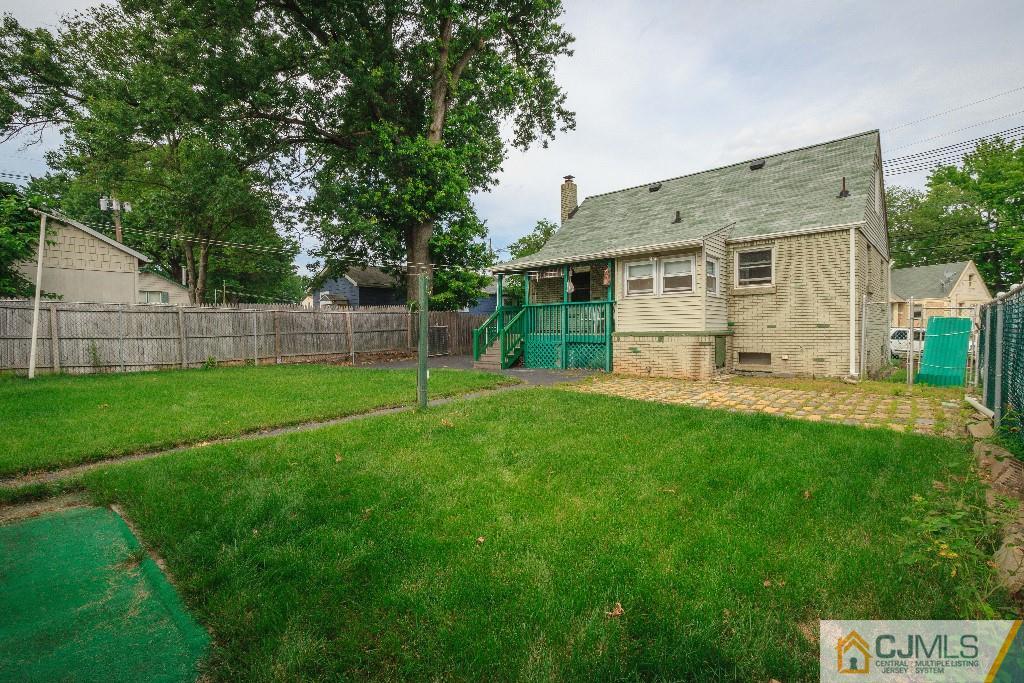 129 Middlesex Avenue Iselin, NJ 08830 - Photo 4 of 23 a view of an house with backyard space and garden